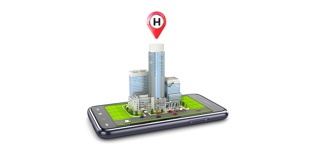 A model of a high-rise hospital placed on a smartphone screen. 3D illustration.